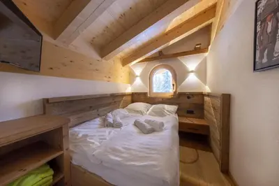 Ein Bett oder Betten in einem Zimmer der Unterkunft Sam Alm Top 3