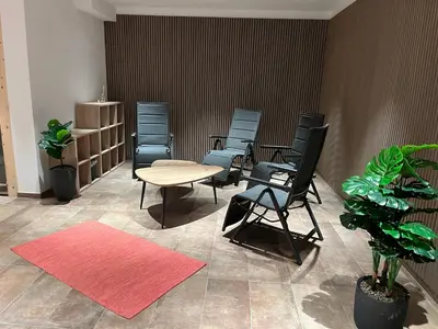 Ein Sitzbereich in der Unterkunft Ferienhäuser Schweitzer
