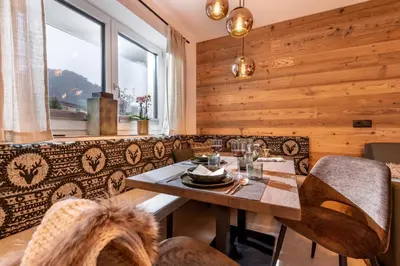 Ein Sitzbereich in der Unterkunft Appartement's Maroslhof