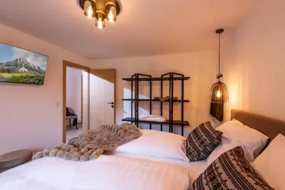 Ein Bett oder Betten in einem Zimmer der Unterkunft Appartement's Maroslhof