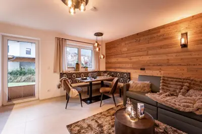 Ein Sitzbereich in der Unterkunft Appartement's Maroslhof