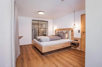 Ein Bett oder Betten in einem Zimmer der Unterkunft Der Stadlmeyer
