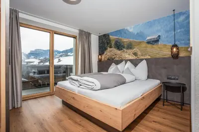 Ein Bett oder Betten in einem Zimmer der Unterkunft Der Stadlmeyer
