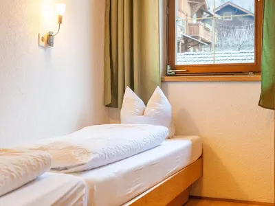 Ein Bett oder Betten in einem Zimmer der Unterkunft House in Fügen near Zillertal Ski Slopes