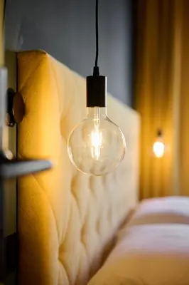 Ein Bett oder Betten in einem Zimmer der Unterkunft Boutique House happYellow Saalbach