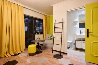 Ein Bett oder Betten in einem Zimmer der Unterkunft Boutique House happYellow Saalbach