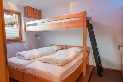 Ein Bett oder Betten in einem Zimmer der Unterkunft Haus Frida Top 33