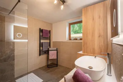 Ein Badezimmer in der Unterkunft Chalet der Erzstadl