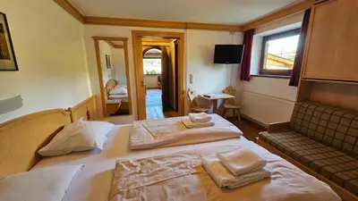 Ein Bett oder Betten in einem Zimmer der Unterkunft Absolute Active Resort Margret