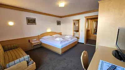 Ein Bett oder Betten in einem Zimmer der Unterkunft Absolute Active Resort Margret