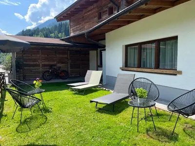 Ein Garten an der Unterkunft Boutique Apartment BERGLIEBE inklusive Joker Card Sommer