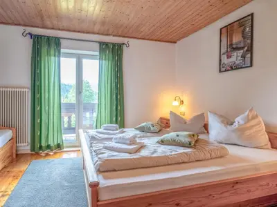 Ein Bett oder Betten in einem Zimmer der Unterkunft Platzhirsch Small