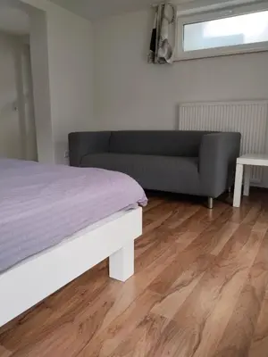 Ein Bett oder Betten in einem Zimmer der Unterkunft Sagzahnblick 2