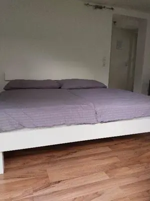 Ein Bett oder Betten in einem Zimmer der Unterkunft Sagzahnblick 2