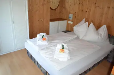 Ein Bett oder Betten in einem Zimmer der Unterkunft Apartment Renate