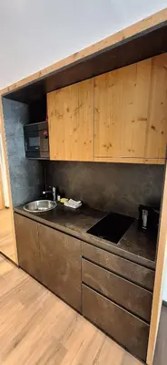 Küche/Küchenzeile in der Unterkunft SkiWelt-Lodge Brixen im Thale