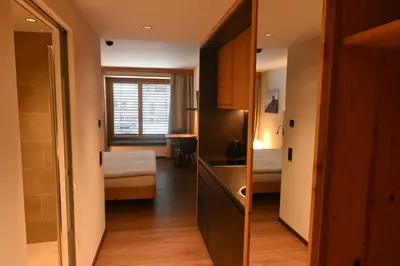 Ein Bett oder Betten in einem Zimmer der Unterkunft SkiWelt-Lodge Brixen im Thale