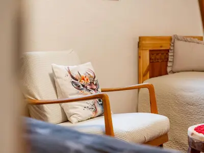 Ein Sitzbereich in der Unterkunft Alpenlodge Steiger XL
