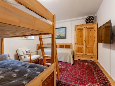 Ein Bett oder Betten in einem Zimmer der Unterkunft Alpenlodge Steiger XL