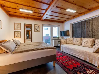Ein Bett oder Betten in einem Zimmer der Unterkunft Alpenlodge Steiger