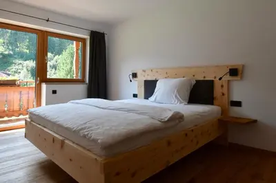 Ein Bett oder Betten in einem Zimmer der Unterkunft Biobauernhof Obermühle