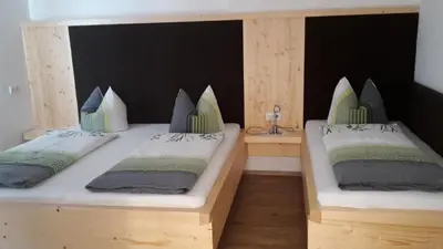 Ein Bett oder Betten in einem Zimmer der Unterkunft Ferienwohnung Tobias