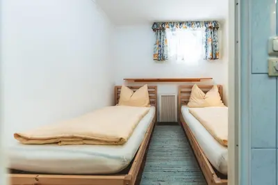 Ein Bett oder Betten in einem Zimmer der Unterkunft Ferienwohnung Seighäusl