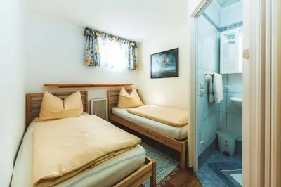 Ein Bett oder Betten in einem Zimmer der Unterkunft Ferienwohnung Seighäusl