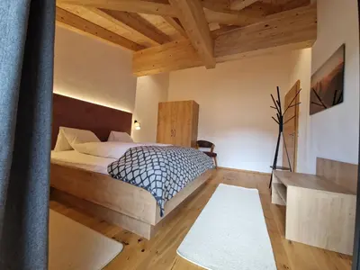 Ein Bett oder Betten in einem Zimmer der Unterkunft Ferienhof Adl-Au