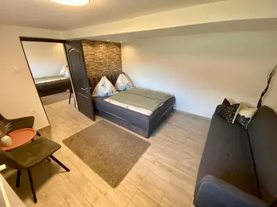 Ein Bett oder Betten in einem Zimmer der Unterkunft Mountain Lodge