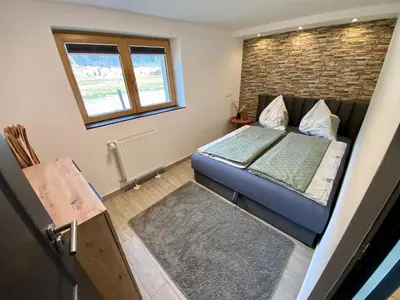 Ein Bett oder Betten in einem Zimmer der Unterkunft Mountain Lodge