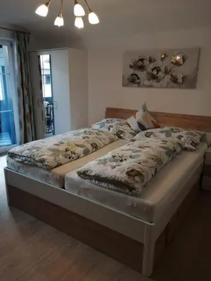 Ein Bett oder Betten in einem Zimmer der Unterkunft Apart Rosi