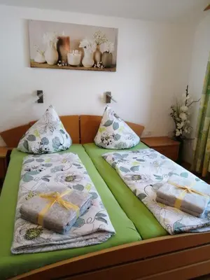 Ein Bett oder Betten in einem Zimmer der Unterkunft Apart Rosi
