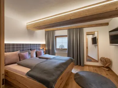 Ein Bett oder Betten in einem Zimmer der Unterkunft Chalet Alexandra