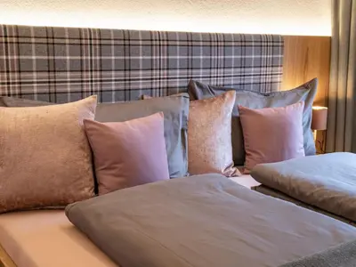 Ein Bett oder Betten in einem Zimmer der Unterkunft Chalet Alexandra