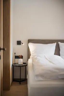 Ein Bett oder Betten in einem Zimmer der Unterkunft Gipfelglueck Duo
