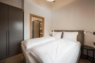 Ein Bett oder Betten in einem Zimmer der Unterkunft Gipfelglueck Duo