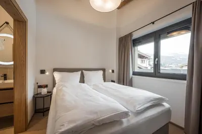 Ein Bett oder Betten in einem Zimmer der Unterkunft Gipfelglueck Duo
