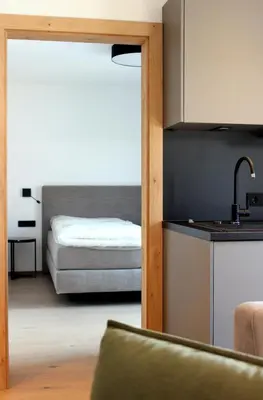 Ein Bett oder Betten in einem Zimmer der Unterkunft Gipfelglueck Premium