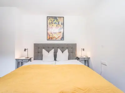 Ein Bett oder Betten in einem Zimmer der Unterkunft Suite Spielberg