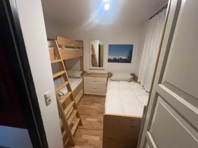 Ein Bett oder Betten in einem Zimmer der Unterkunft Chalet Alpine Royal A Top 1