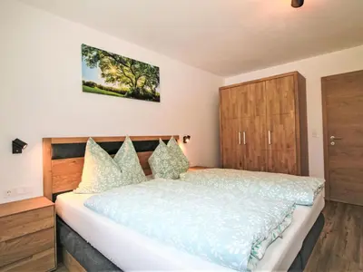 Ein Bett oder Betten in einem Zimmer der Unterkunft Apartment Vom Gerslosstein zum Rumerblick by Interhome