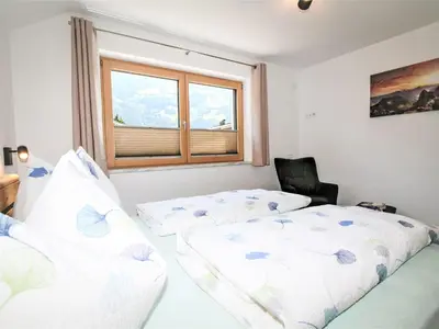 Ein Bett oder Betten in einem Zimmer der Unterkunft Apartment Gerlosstein Blick by Interhome