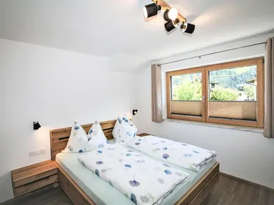Ein Bett oder Betten in einem Zimmer der Unterkunft Apartment Gerlosstein Blick by Interhome