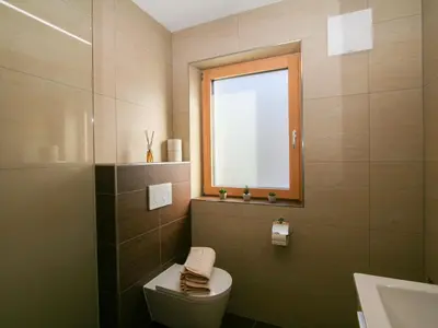 Ein Badezimmer in der Unterkunft Apartment Ferienwohnung Selina by Interhome