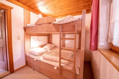 Ein Bett oder Betten in einem Zimmer der Unterkunft Polle Hütte EG