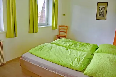 Ein Bett oder Betten in einem Zimmer der Unterkunft Sport Hölzl Top 9