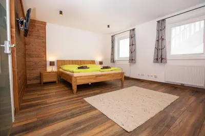 Ein Bett oder Betten in einem Zimmer der Unterkunft Chalet Hirsch
