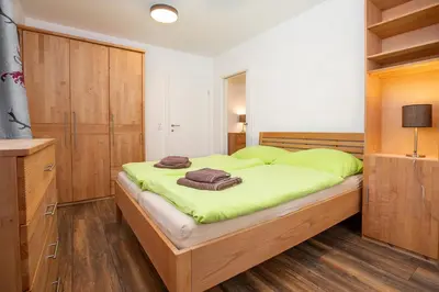 Ein Bett oder Betten in einem Zimmer der Unterkunft Chalet Hirsch