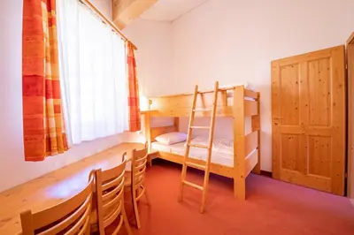 Ein Bett oder Betten in einem Zimmer der Unterkunft Am Edelweißanger Haus A Top 7
